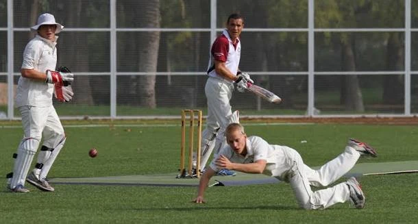 Fielder diving for the ball